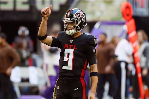 Falcons quarterback Desmond Ridder (9)gives thumps up during warm-ups before the Falcons face the Falcons face the Minnesota Vikings on Sunday, November 5, 2023, at Mercedes-Benz Stadium in Atlanta. 
Miguel Martinz/miguel.martinezjimenez@ajc.com