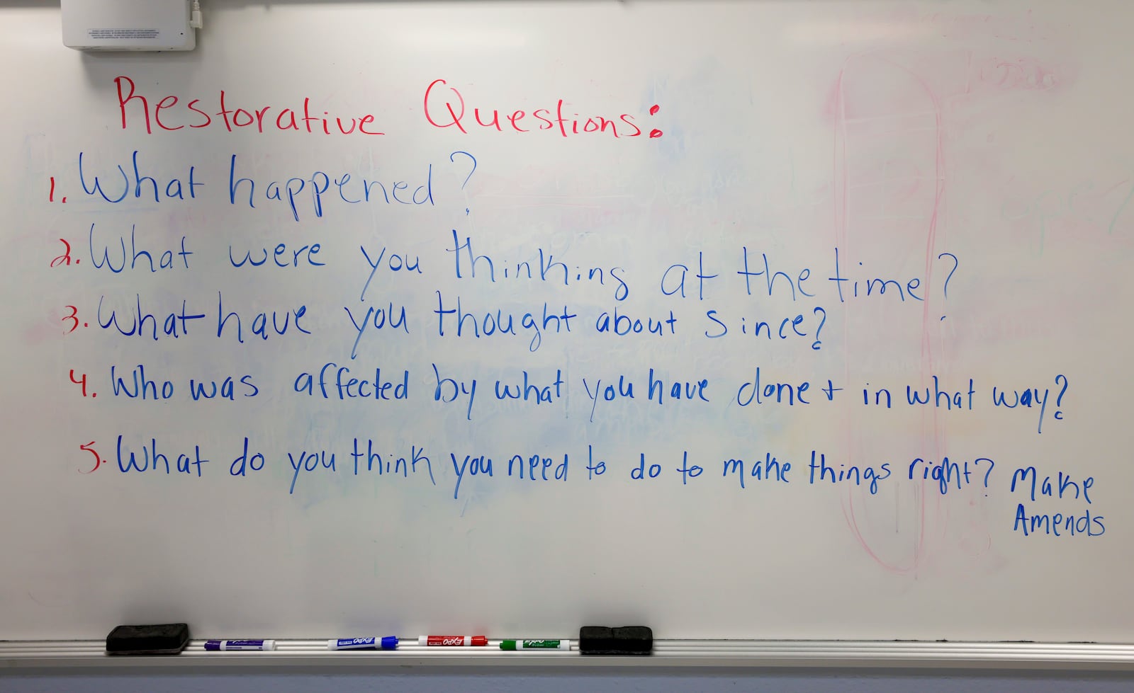 Guidelines are posted where students will take part in a restorative circle, where students are prompted to talk about conflict issues going on in their lives and where conflict resolution skills are discussed, at Tri-Cities High School in East Point on Tuesday, March 29, 2022.   (Bob Andres / robert.andres@ajc.com)