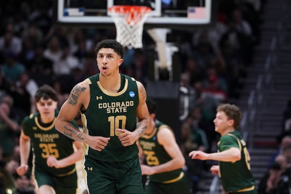 Colorado State guard Nique Clifford reacts after making a basket against Memphis during the second half in the first round of the NCAA college basketball tournament, Friday, March 21, 2025 in Seattle. (AP Photo/Lindsey Wasson)