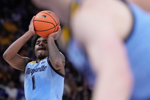 Marquette's Kam Jones shoots during the first half of an NCAA college basketball game Saturday, Mar. 8, 2025, in Milwaukee. (AP Photo/Morry Gash)