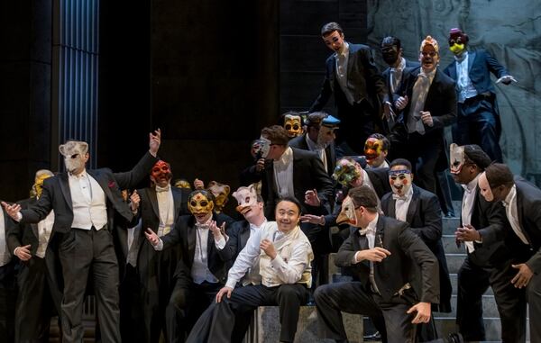 At center bottom, the Duke of Mantua (Won Whi Choi) is surrounded by his courtiers. Photo: Rafterman / Courtesy of the Atlanta Opera