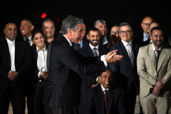 US Secretary of State Antony Blinken speaks to members of the trip and staff from the US Embassy in Jordan before boarding his plane in Aqaba on Saturday, Dec. 14, 2024. (Andrew Caballero-Reynolds/Pool Photo via AP)