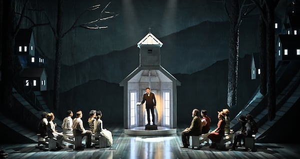 Jeremy Aggers (center) leads the cast of "Darlin' Cory," an Appalachian folk musical continuing through Oct. 3 at the Alliance Theatre.

Courtesy of Greg Mooney