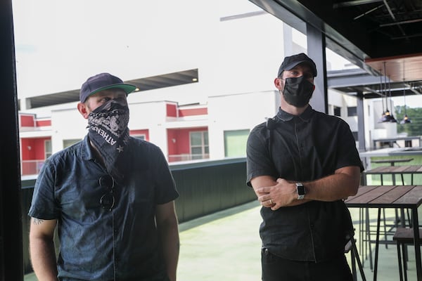 Zero Mile co-founders Scott Orvold, left, and Alan Sher, right, talk about how the new music venue, The Eastern, was constructed in Atlanta’s Reynoldstown neighborhood, (Alyssa Pointer/Atlanta Journal Constitution)