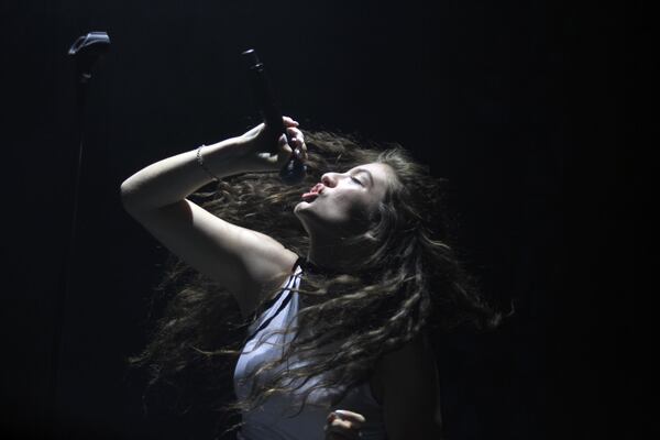 Sept 19, 2014 - ATLANTA - Lorde, 17-year-old singer/songwriter from New Zealand, performing on Day 1 of Music Midtown at Piedmont Park on Friday. In 2013 her debut single "Royals," became an international crossover hit, peaking on the Billboard Hot 100 and becoming the youngest solo artist with a number one hit since Tiffany. (Akili-Casundria Ramsess/Special to the AJC) Lorde performed a captivating set. Photo: Akili-Casundria Ramsess/Special to the AJC