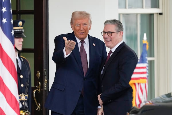 Britain's Prime Minister Keir Starmer is greeted by President Donald Trump as he arrives at the White House in Washington, Thursday, Feb. 27, 2025. (AP Photo/Ben Curtis)