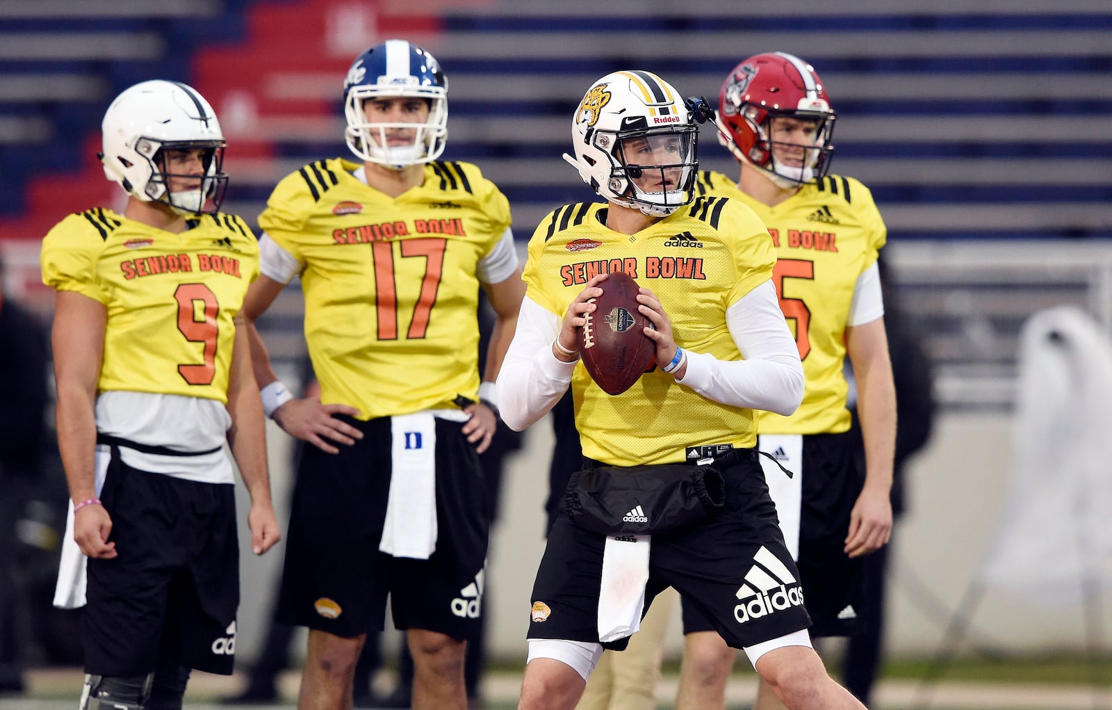 Drew Lock of Missouri drops back to pass during the North squad practice at the Senior Bowl.