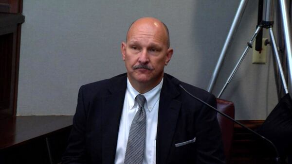 Cobb County detective Ronson "RB" Bridges Smith, who works in the high tech crimes squad, testifies during the murder trial of Justin Ross Harris at the Glynn County Courthouse in Brunswick, Ga., on Wednesday, Oct. 19, 2016. (screen capture via WSB-TV)