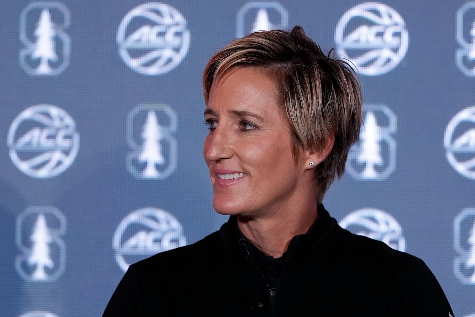 Stanford head coach Kate Paye speaks during a ACC women's NCAA college basketball media day, Wednesday, Oct. 9, 2024, in Charlotte, N.C. (AP Photo/Chris Carlson)