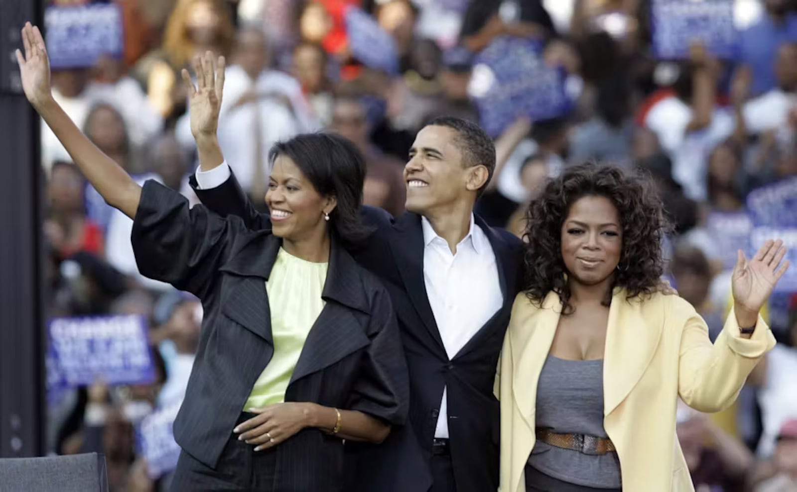 Michelle and Barack Obama campaign with Oprah Winfrey in 2008. Mary Ann Chastain/AP 2008