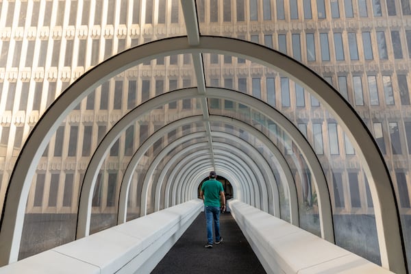 A person enters Peachtree Center in Atlanta on Monday, Sept. 25, 2023. (Arvin Temkar / arvin.temkar@ajc.com)