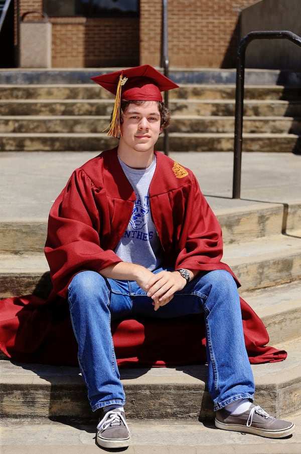 Jake Preece poses for a portrait on Friday, June 12, 2020, at Brookwood High School in Snellville, Georgia. Thousands of K-12 schools and colleges closed in the middle of the spring semester this year due to the coronavirus pandemic. For high school and college seniors, the closure not only meant the end of in-person classes, but also no traditional senior rituals like prom and graduation. 