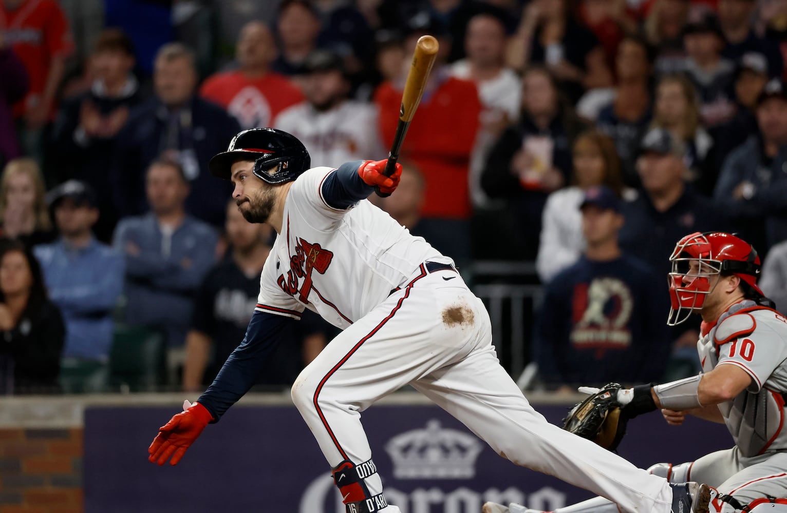 Atlanta Braves third baseman Austin Riley (27) hits an RBI single against the Philadelphia Phillies during the sixth inning of game two of the National League Division Series at Truist Park in Atlanta on Wednesday, October 12, 2022. (Jason Getz / Jason.Getz@ajc.com)