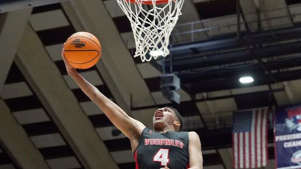 Woodward Academy's Will Richards (4) shoots a layup against Cross Creek in the second half of the Class 4A boys title basketball game Friday March 6, 2020, at the Macon Centreplex in Macon. (Tami Chappell/For the AJC)