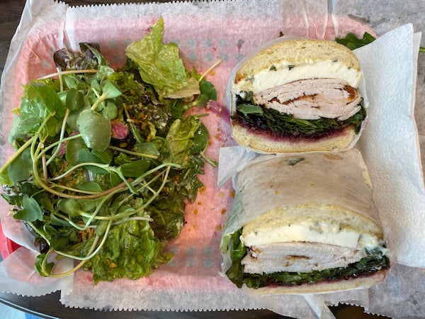 For a taste of Thanksgiving, try the Turkey Stack, with cranberry relish among the fillings. All sandwiches come with house-made chips or a salad. Ligaya Figueras/ligaya.figueras@ajc.com