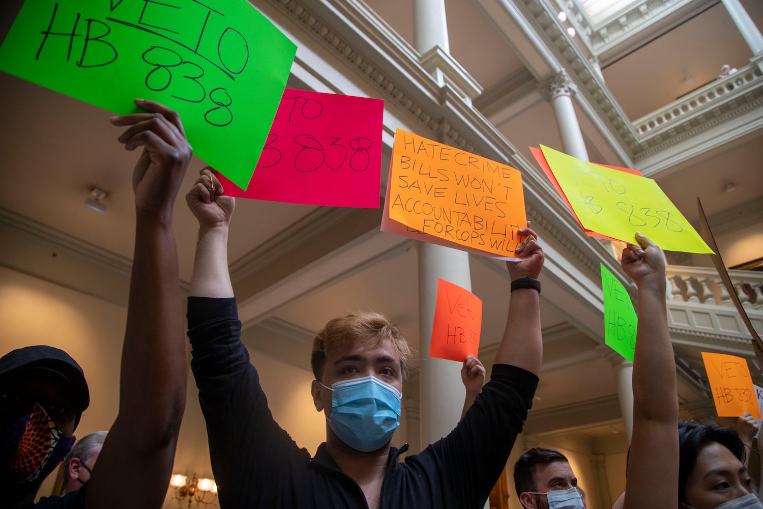 PHOTOS: Gov. Kemp signs hate-crimes bill on last day of legislative session