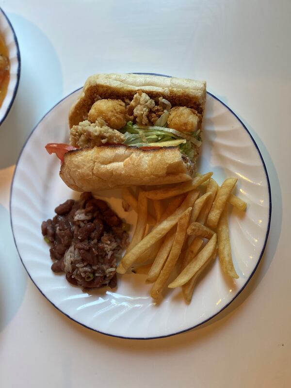 This carryout meal includes a Shoyster po’boy with fried oysters and fried shrimp, lettuce, tomato and remoulade. CONTRIBUTED BY BOB TOWNSEND