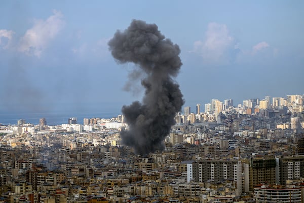 Smoke rises after an Israeli airstrike on Dahiyeh, in the southern suburb of Beirut, Lebanon, Wednesday, Nov. 13, 2024. (AP Photo/Hassan Ammar)