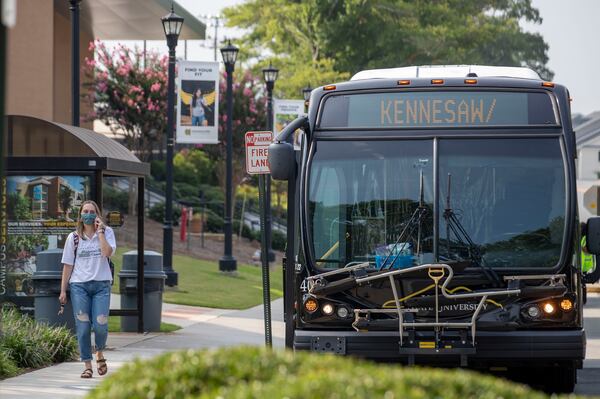 08/17/2020 - Kennesaw, Georgia - A woman walks on the campus during the first day of classes at Kennesaw State University's main campus in Kennesaw, Monday, August 17, 2020. (ALYSSA POINTER / ALYSSA.POINTER@AJC.COM)