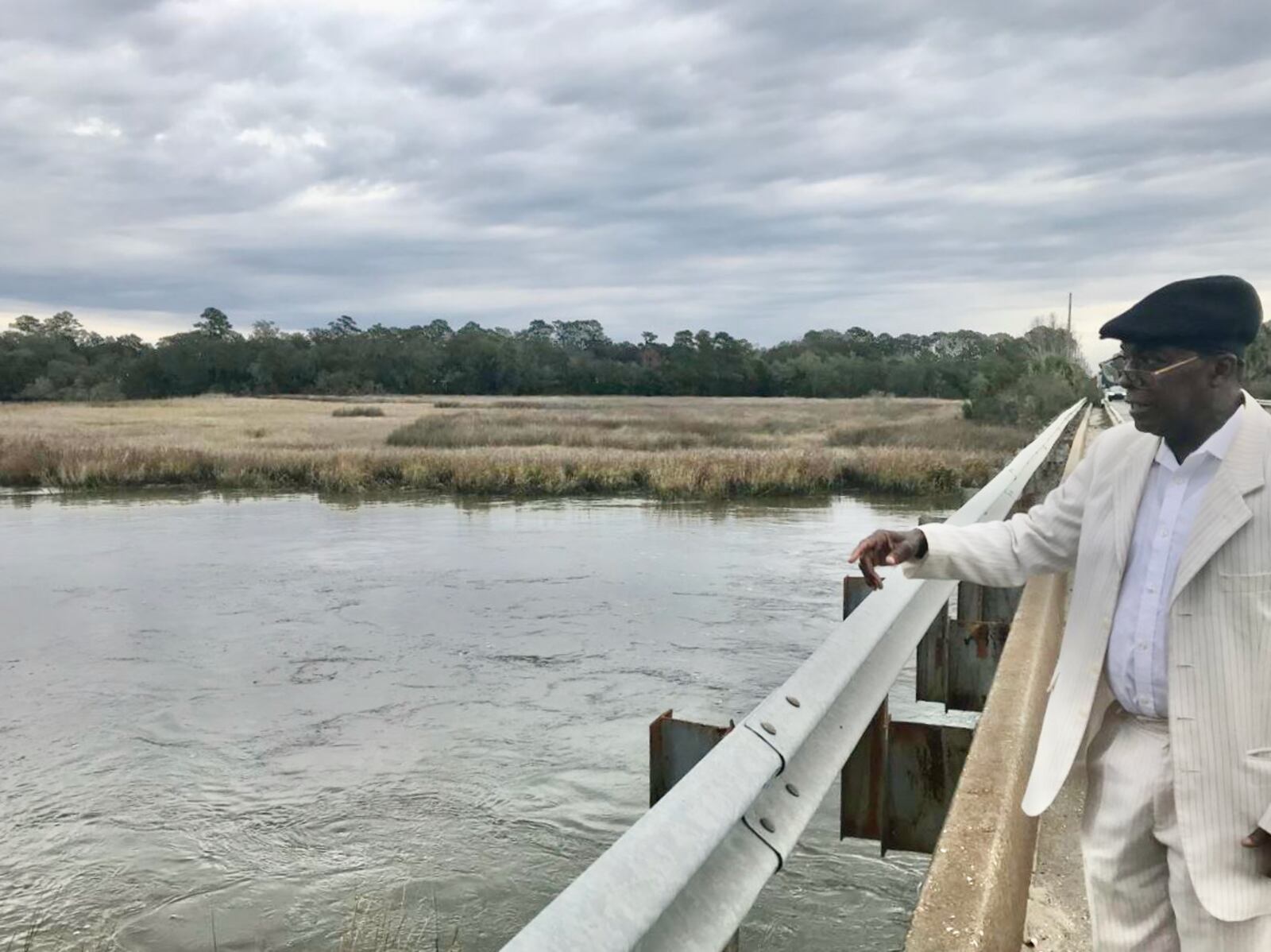 Griffin Lotson stands on a bridge overlooking the spot he and others believe captive Africans rebelled and went into the marshy waters of Dunbar Creek rather than be enslaved.
Courtesy Shelia Poole