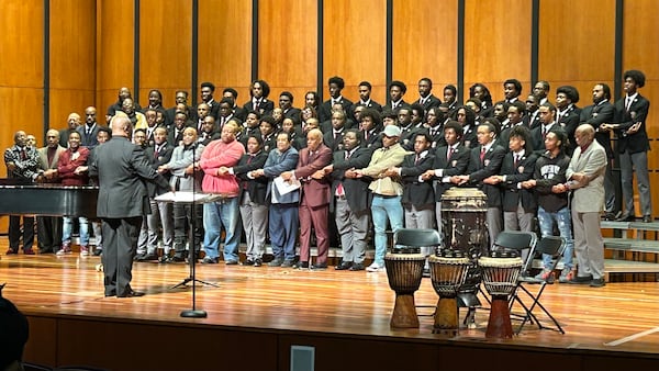 The Morehouse College Glee Club members and alumni join to sing the Morehouse Hymn during a February performance in Atlanta. 