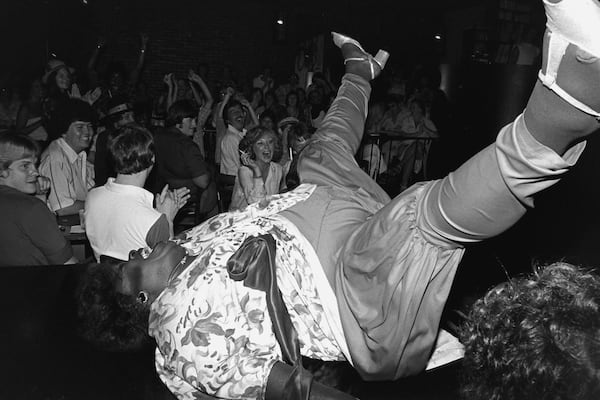 The raucous performances inside the Sweet Gum Head, which hosted Atlanta's most notorious drag shows in the 1970s, are captured in a new history of LGBT Atlanta by Martin Padgett. This scene features a performance by character dubbed Bertha Butts. Photo: Susan W. Raines