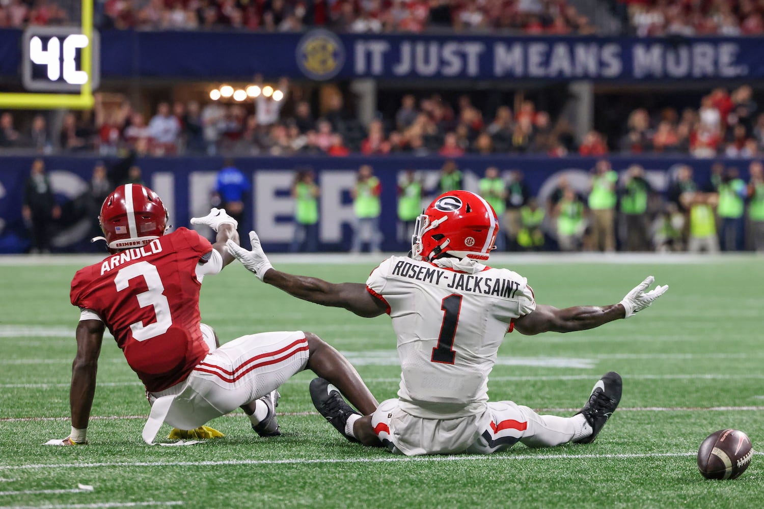 Alabama Crimson Tide defensive back Terrion Arnold (3) is called for interference against Georgia Bulldogs wide receiver Marcus Rosemy-Jacksaint (1) during the second half of the SEC Championship football game at the Mercedes-Benz Stadium in Atlanta, on Saturday, December 2, 2023. (Jason Getz / Jason.Getz@ajc.com)