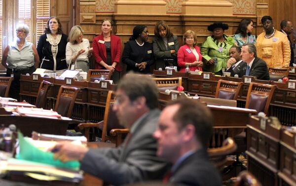 Several female state reps line the walls of the Senate chamber to show their interest in the debate of House Bill 954, commonly referred to as the "fetal pain" bill on March 26, 2012. Jason Getz jgetz@ajc.com