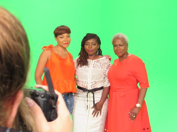  Rachel Joyce (left) taking photos of Christine White, Denene Millner and Monica Pearson in front of a green screen. CREDIT: Rodney Ho/rho@ajc.com