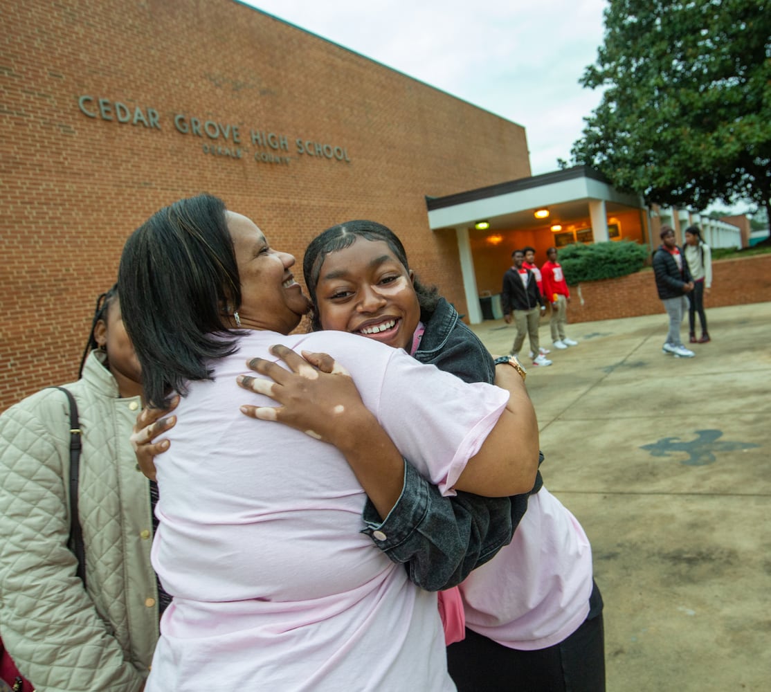 DeKalb County school hugs students every Wednesday on the way in to class