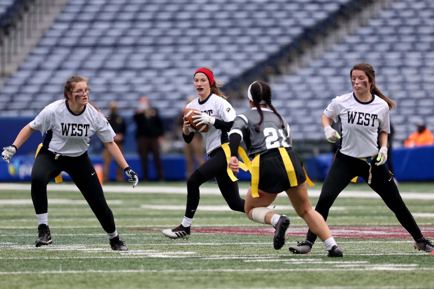 West Forsyth quarterback Haylee Dornan drops back to pass during the first half against Hillgrove in the Class 6A-7A Flag Football championship at Center Parc Stadium Monday, December 28, 2020 in Atlanta, Ga.. JASON GETZ FOR THE ATLANTA JOURNAL-CONSTITUTION