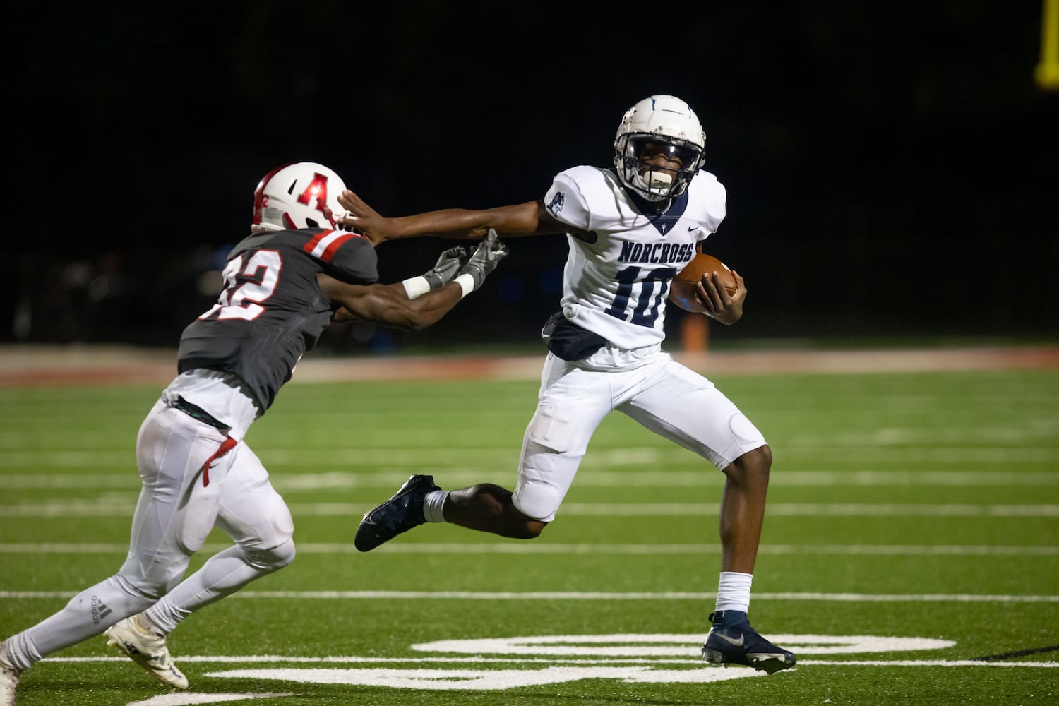 Norcross quarterback Arrington Watkins (10) runs the ball at a GHSA high school football game between Archer High School and Norcross in Lawrenceville, GA., on Friday, November 5, 2021. (Photo/Jenn Finch)