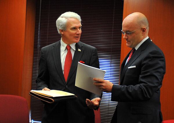 Members of the Immigration Enforcement Review Board, Phil Kent, left, and Shawn Hanley talk in this file photo from the board’s first meeting in 2011. State law limits board members to two, two-year terms. Brant Sanderlin bsanderlin@ajc.com