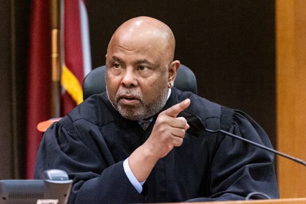  Fulton County Chief Judge Ural Glanville speaks to the jury ahead of opening statements at Fulton County Courthouse on Monday, Nov. 27, 2023.   (Steve Schaefer/steve.schaefer@ajc.com)