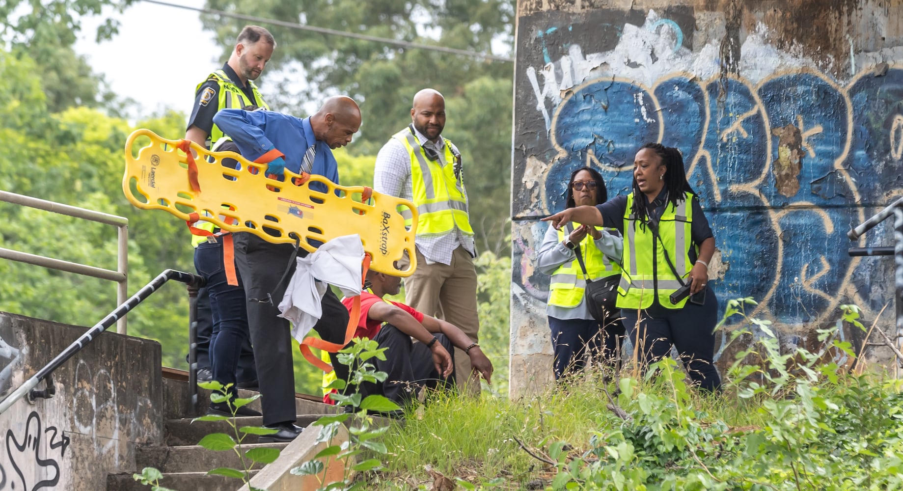 MARTA police and the Fulton County Medical Examiner’s office were on the scene of Rocky Ford Road and the MARTA train tracks investigating a death that shut down a section of track in Atlanta’s Kirkwood neighborhood after a suspected trespasser was hit and killed Thursday morning, June 6, 2024 by a westbound train. (John Spink/AJC)