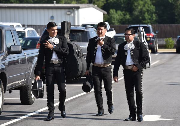 July 12, 2017 Lawrenceville - Mariachi band members arrive for the visitation for Gwinnett County family victims slain last week- Martin Romero, 33, and four siblings, including 1-year-old Axel, 4-year-old Dillan, 7-year-old Dacota and 10-year-old Isabela Martinez - at Byrd and Flanigan Crematory & Funeral Service in Lawrenceville. HYOSUB SHIN / HSHIN@AJC.COM