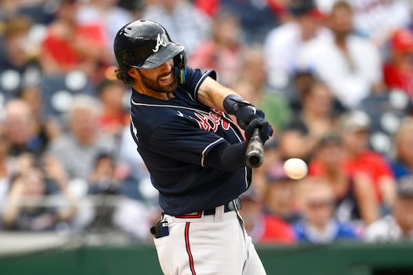 Atlanta Braves' Dansby Swanson in action during a baseball game against the Washington Nationals, Saturday, July 16, 2022, in Washington. (AP Photo/Nick Wass)