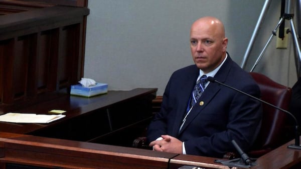 Detective Carey Grimstead testifies at the murder trial for Justin Ross Harris at the Glynn County Courthouse in Brunswick, Ga., on Wednesday, Oct. 26, 2016. Grimstead was explaining how police created a 3D animation of Harris' SUV. The animation video has been hotly contested by Harris' attorneys, who say that the child car seat shown in the video was misplaced. (screen capture via WSB-TV)