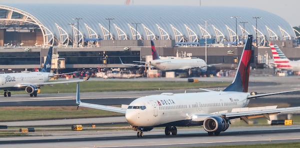 Jets on the airfield at Hartsfield-Jackson International Airport in April 2021. (John Spink / John.Spink@ajc.com)

