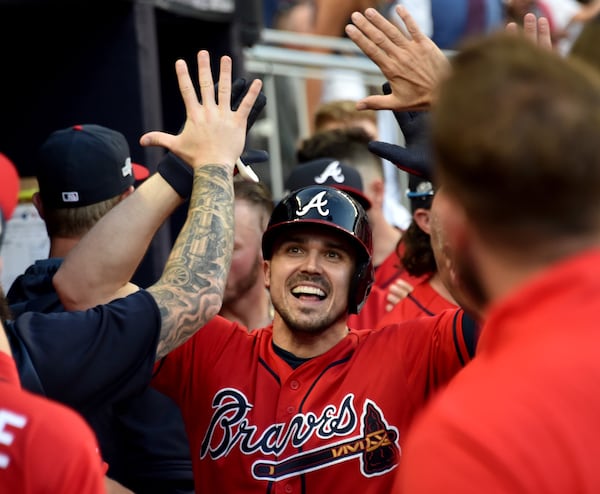 Braves left fielder Adam Duvall (23) celebrates his two-run home run. (Hyosub Shin / Hyosub.Shin@ajc.com)