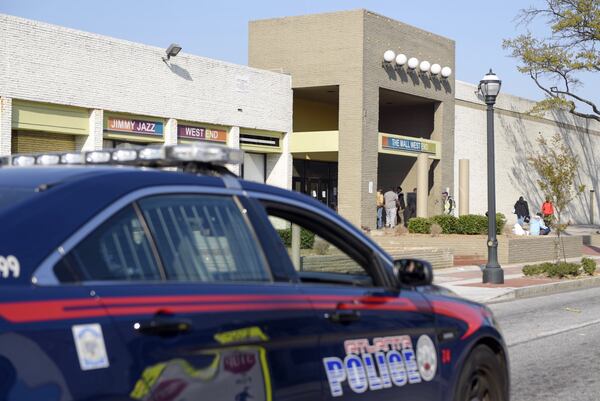 Police are clearing the scene at West End mall. (Credit: David Barnes / For the AJC)