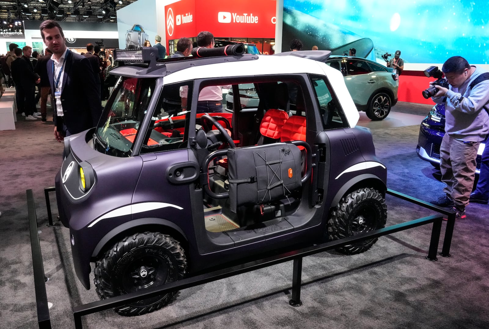 A Citroën Ami Buggy Vision car is presented at the Paris Auto Show, in Paris, Monday, Oct. 14, 2024. (AP Photo/Michel Euler)