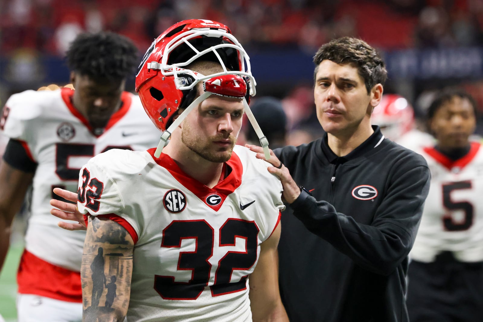 Georgia linebacker Chaz Chambliss (32) walks off of the field after their 27-24 loss to Alabama in the SEC Championship game at Mercedes-Benz Stadium, Saturday, December. 2, 2023, in Atlanta. (Jason Getz / Jason.Getz@ajc.com)