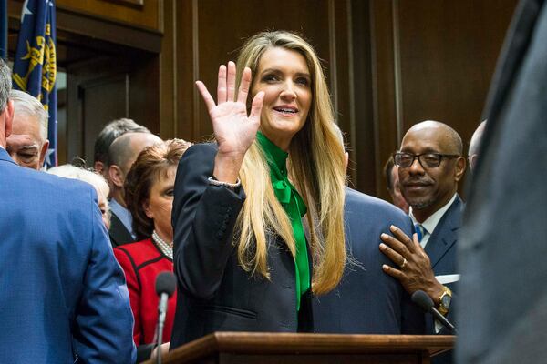 12/04/2019 -- Atlanta, Georgia -- Newly appointed U.S. Senator Kelly Loeffler waves toward supporters following a press conference in the Governor's office at the Georgia State Capitol Building, Wednesday, December 4, 2019.  Georgia Gov. Brian Kemp appointed Kelly Loeffler to the U.S. Senate to take the place of U.S. Senator Johnny Isakson, who is stepping down for health reasons. (ALYSSA POINTER/ALYSSA.POINTER@AJC.COM)