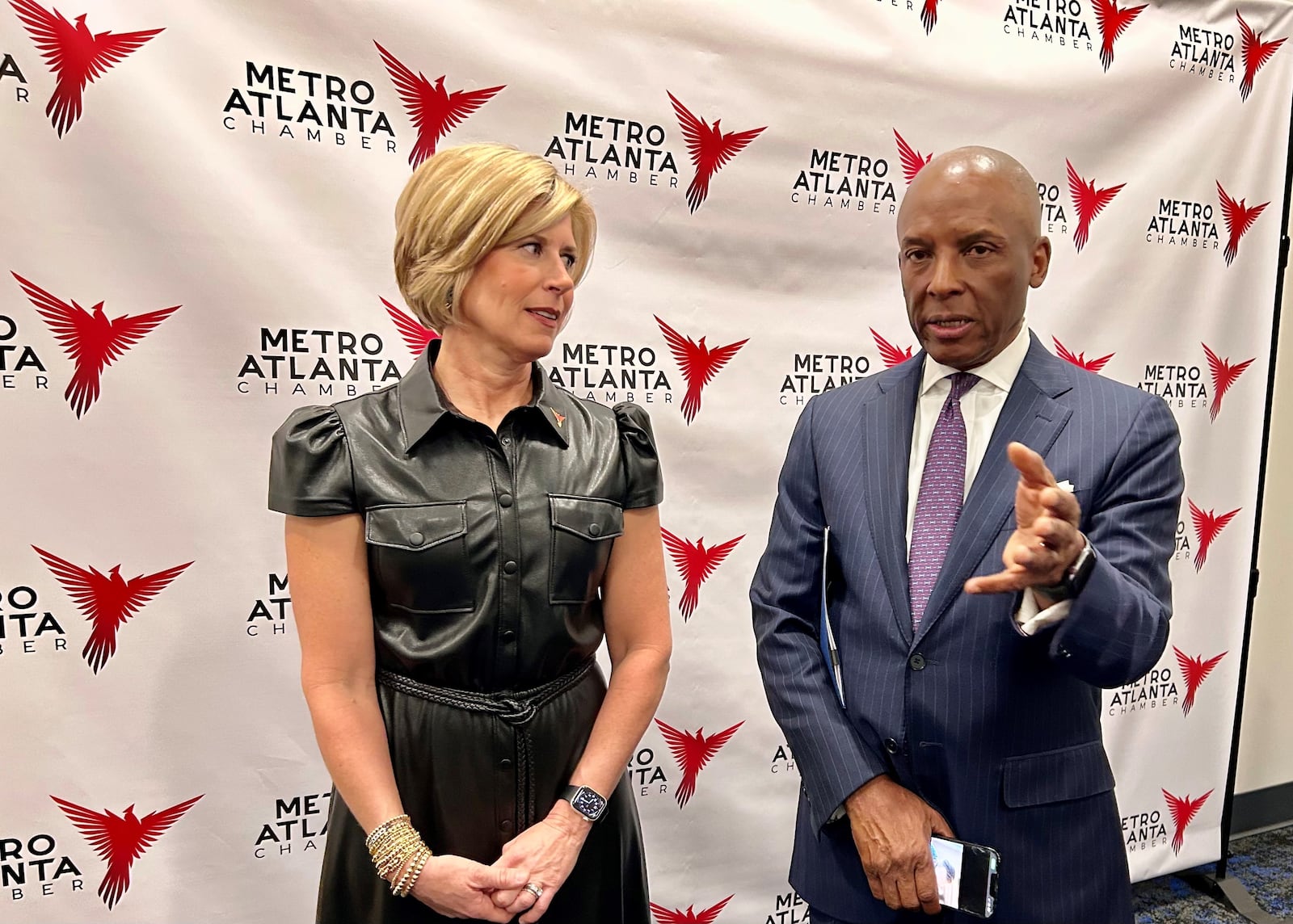 Metro Atlanta Chamber CEO Katie Kirkpatrick (left) chats with Southern Co. CEO Chris Womack, who was also the chamber’s chair for 2024. (J. Scott Trubey/AJC 2023)