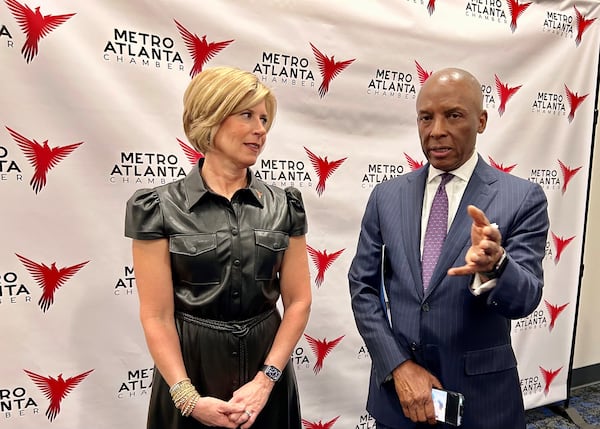 Metro Atlanta Chamber CEO Katie Kirkpatrick (left) chats with Southern Co. CEO Chris Womack, who was also the chamber’s chair for 2024. (J. Scott Trubey/AJC 2023)