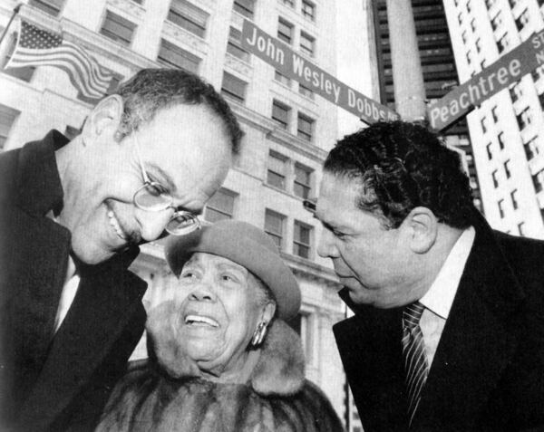  Mayor Bill Campbell (left) joins Irene (Dobbs) Jackson and her son, Maynard Jackson at the dedication of John Wesley Dobbs Avenue. The street is named for the former mayor's maternal grandfather, a civil rights leader who worked to successfully overturn the white primary in Georgia and was known as the "unofficial" mayor of Auburn Avenue. (AJC FILE PHOTO)