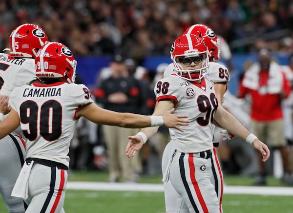 Georgia Bulldogs place kicker Rodrigo Blankenship (98) after kicking one of his two first-half field goals.  Bob Andres  bandres@ajc.com