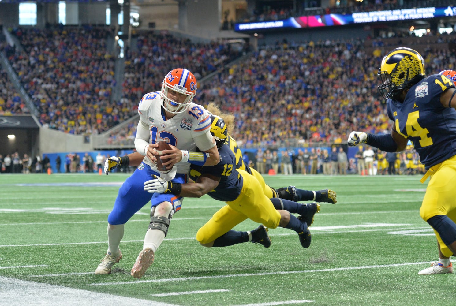 Photos: Florida, Michigan clash in Chick-fil-A Peach Bowl