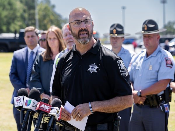 Barrow County Sheriff Jud Smith talks to reporters after four people were killed and nine others were taken to various hospitals following a shooting at Apalachee High School in Barrow County on Wednesday, Sept. 4, 2024. (John Spink/AJC)